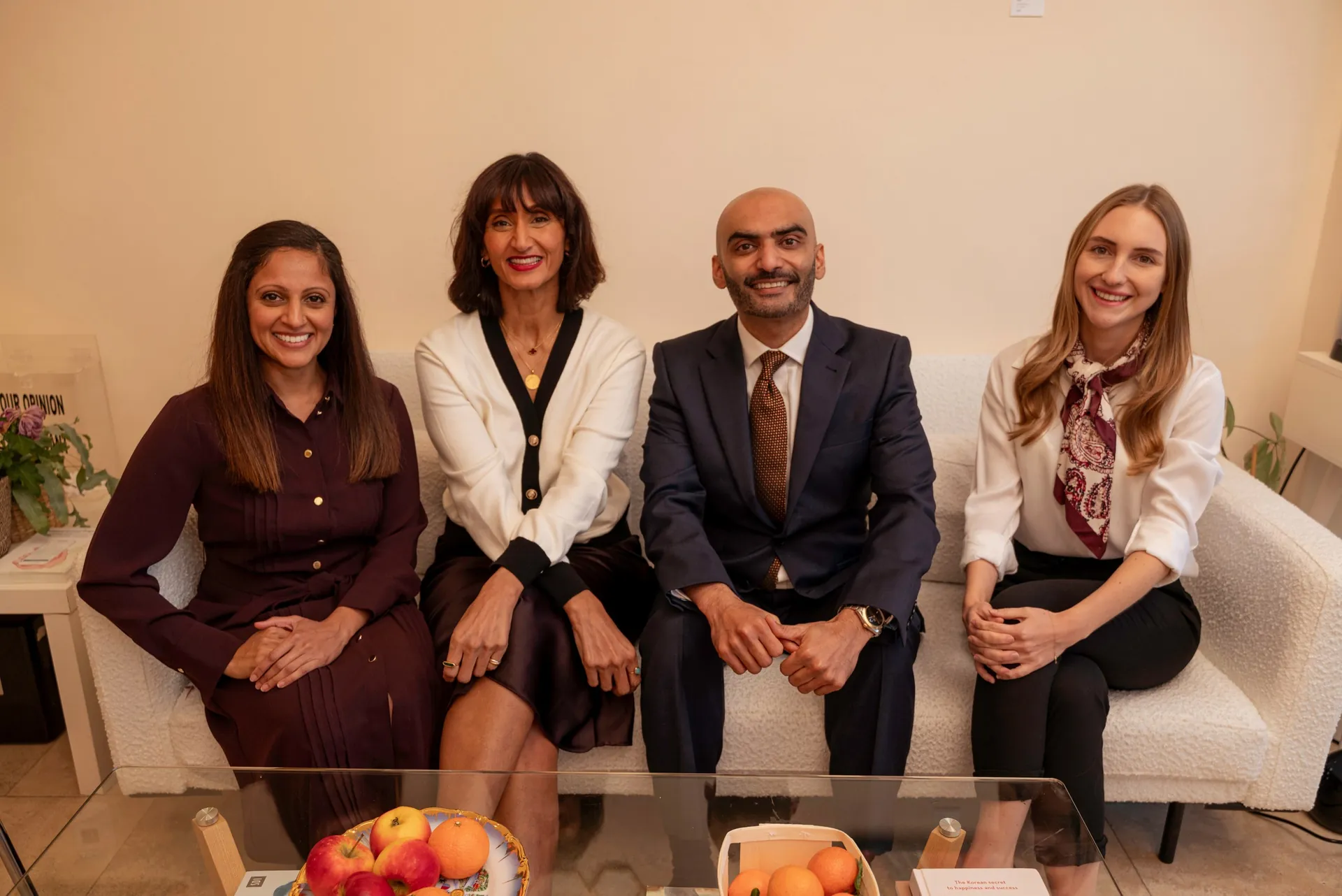 The Dental & Wellness London team seated together in the clinic lounge — psychotherapy