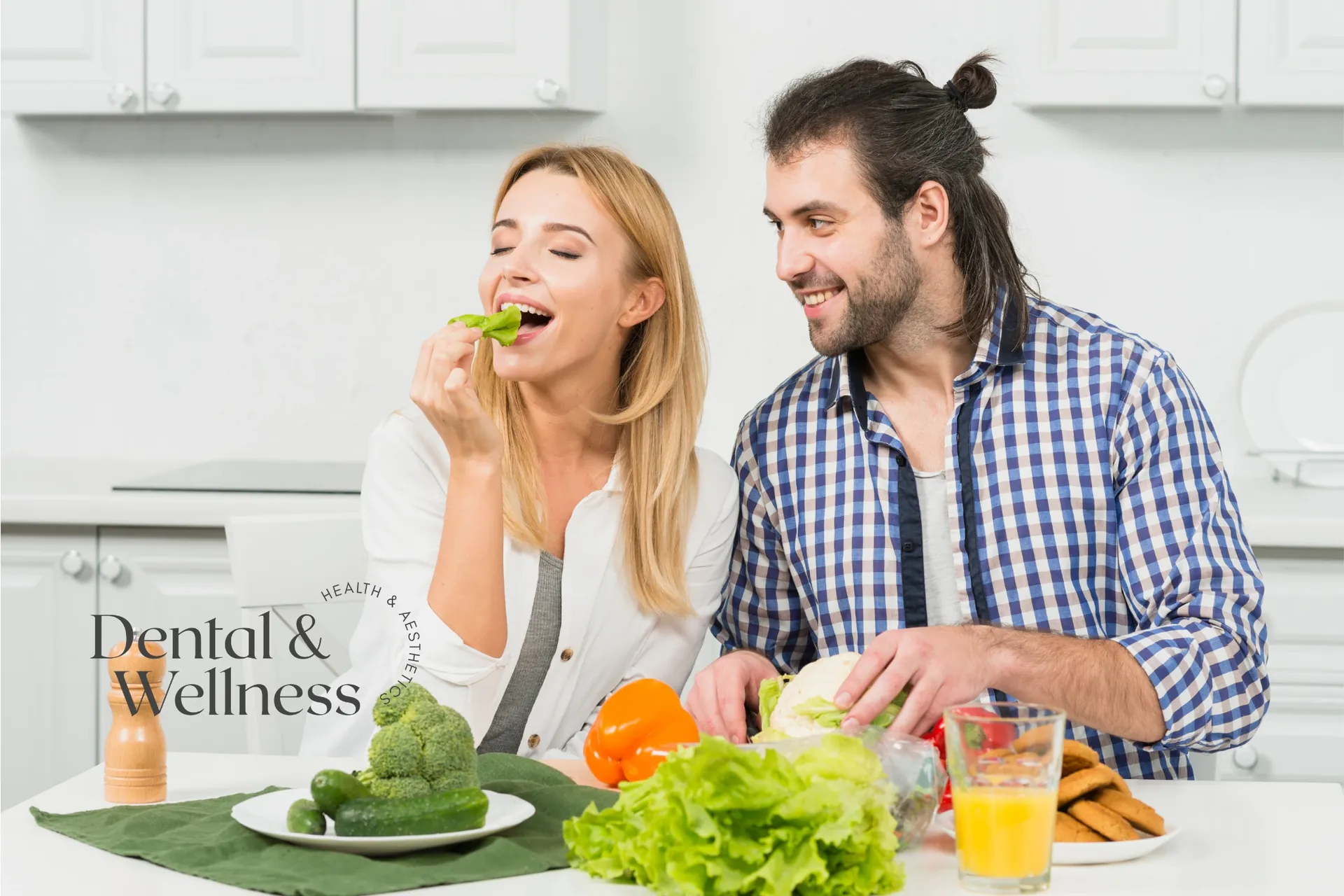 Couple eating fresh vegetables together in their kitchen — bleeding gums