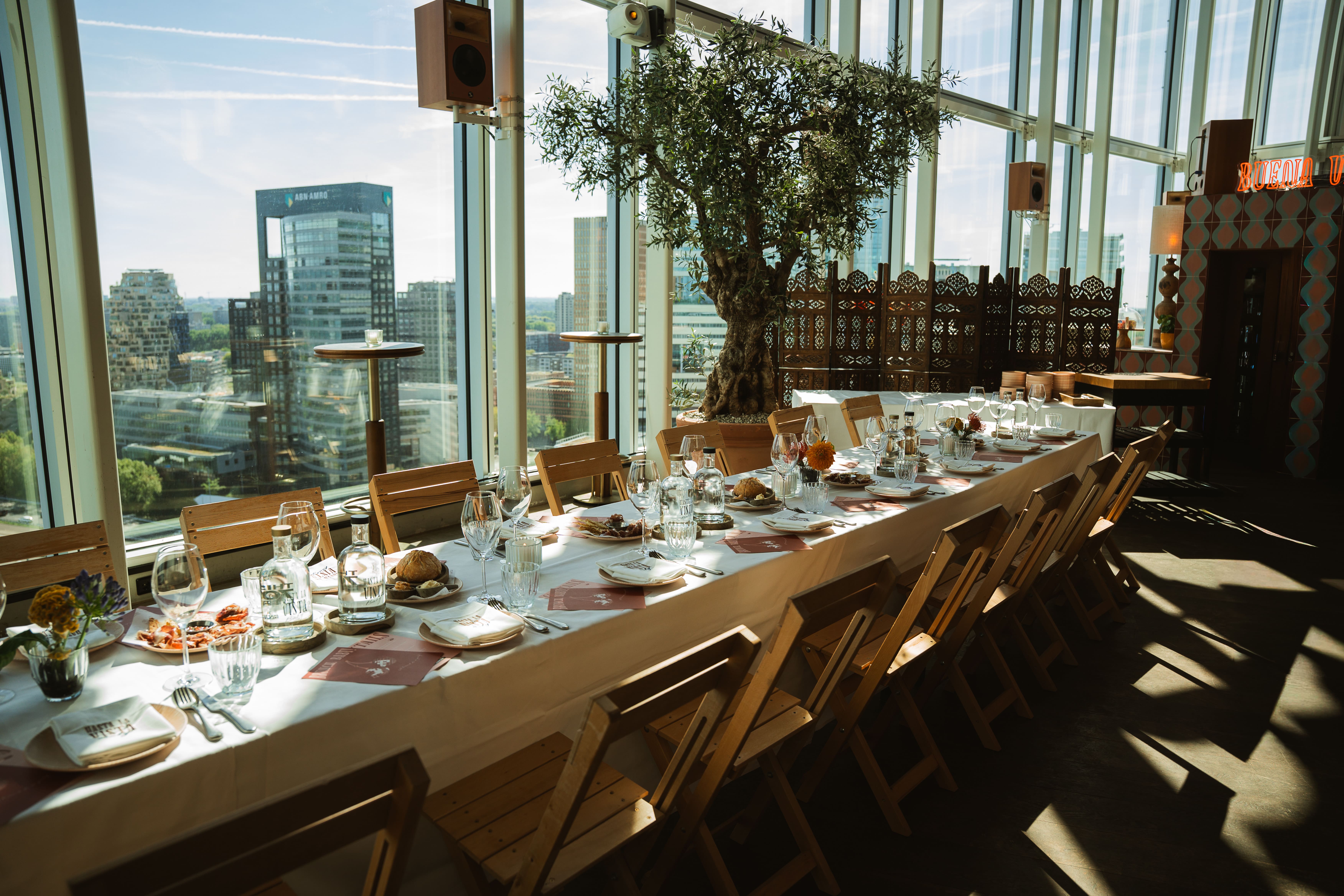 Long table shared dining dinner event at Amsterdam rooftop 