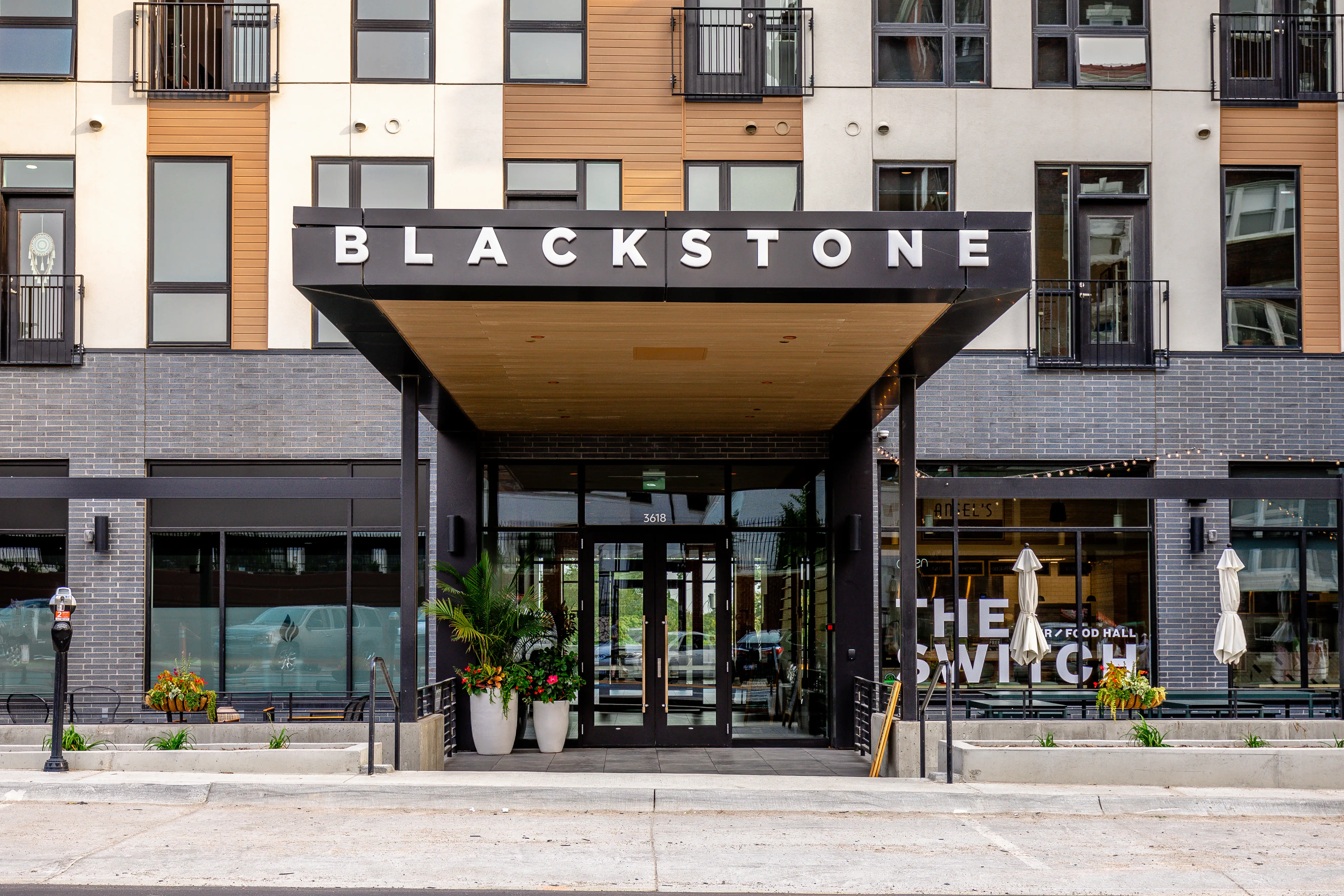 Blackstone Corner mixed-use apartment building marking Blackstone Districts eastward growth in Omaha Nebraska