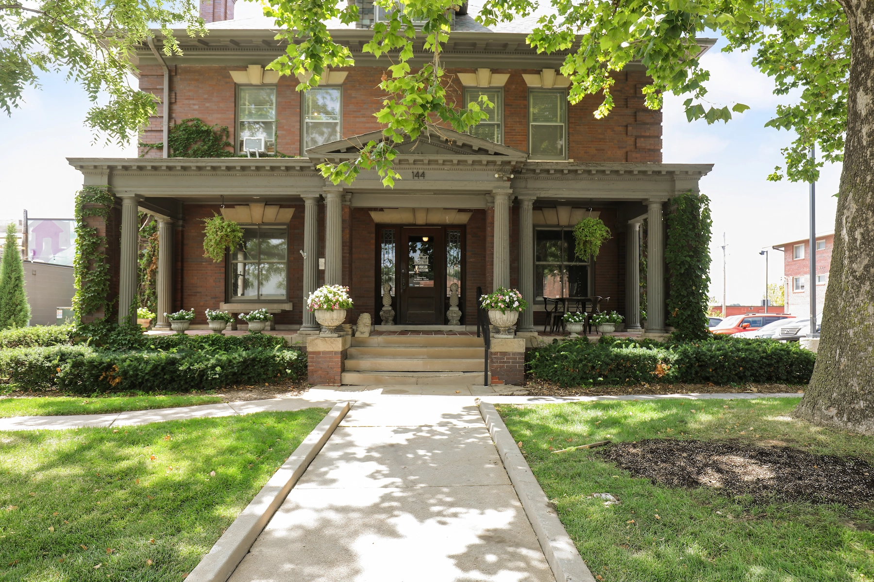 Blackstone Mansion adaptive reuse historic building with office and retail in Omaha's Blackstone District