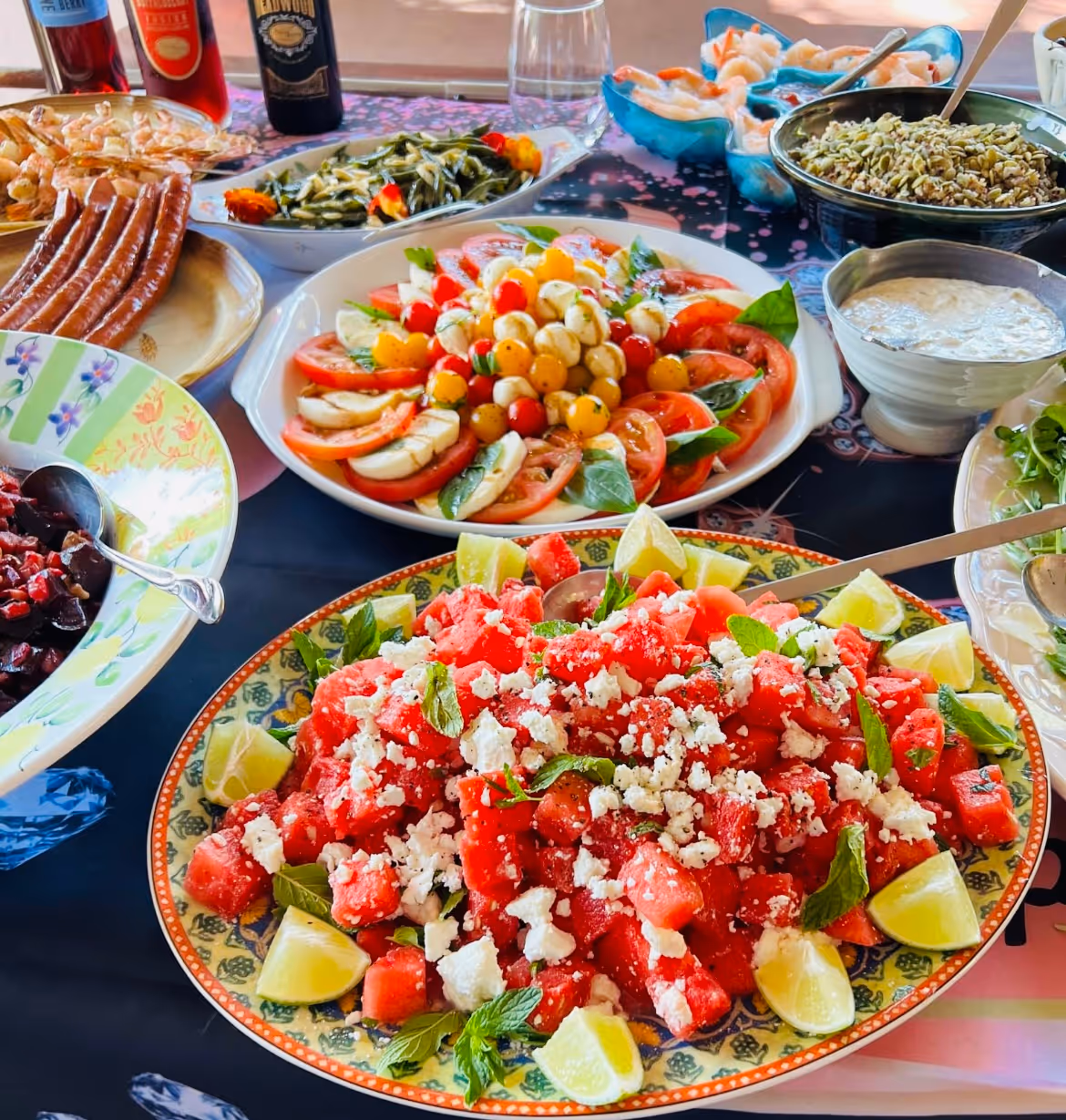 A variety of colorful salads and dishes displayed on a table
