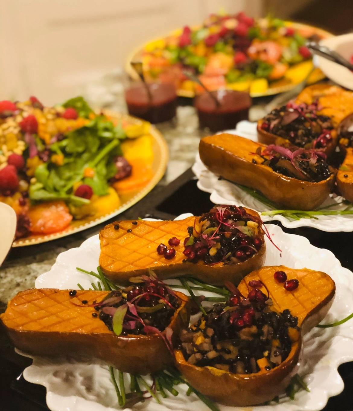 Close-up of five wooden skewers loaded with a variety of charred vegetables, showcasing bright colors and a caramelized finish.