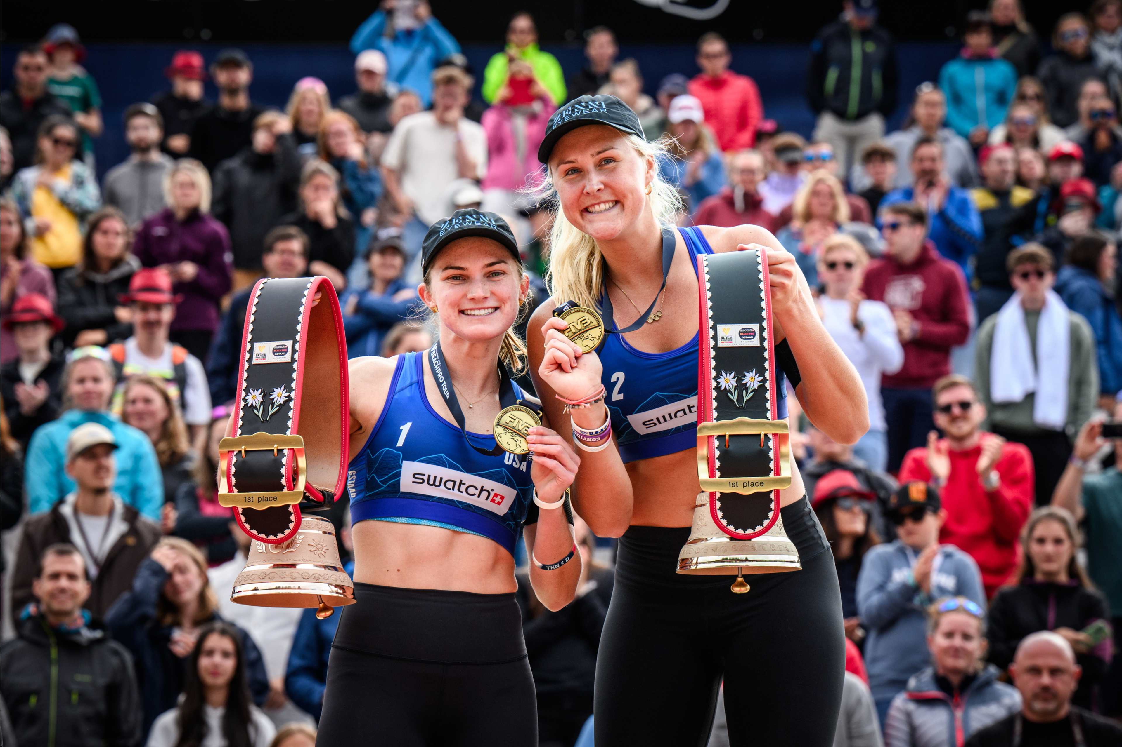 Kloth and Nuss posing with their FIVB Gold medals