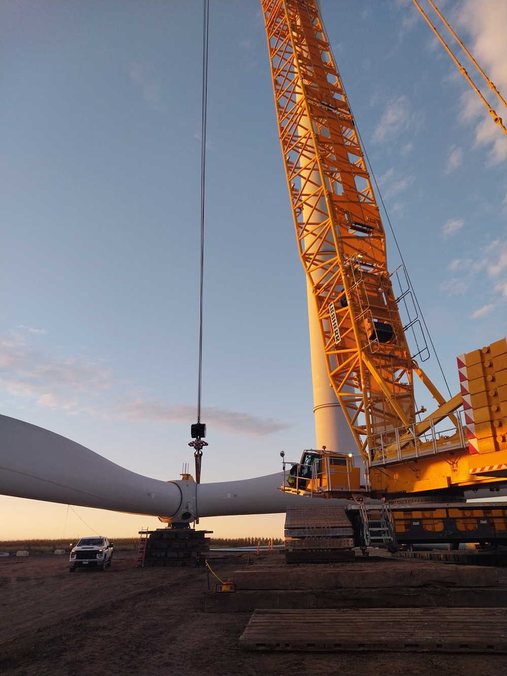 A crane lifting a wind turbine rotor