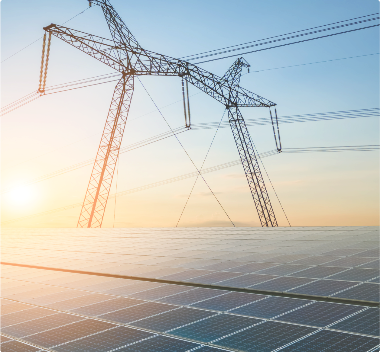 The sun reflecting on a series of solar panels