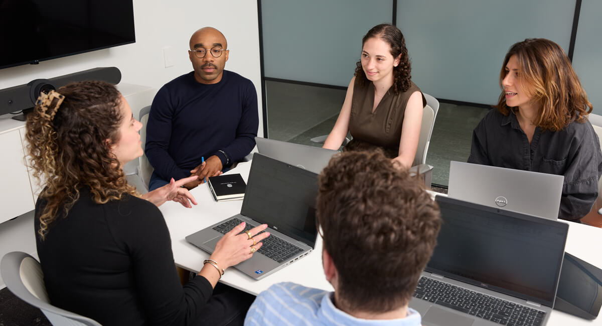 A group of businesspeople having a meeting in a conference room