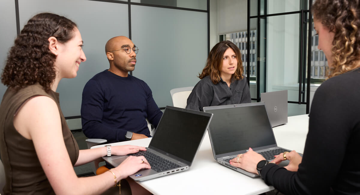 A group of businesspeople having a meeting in a conference room