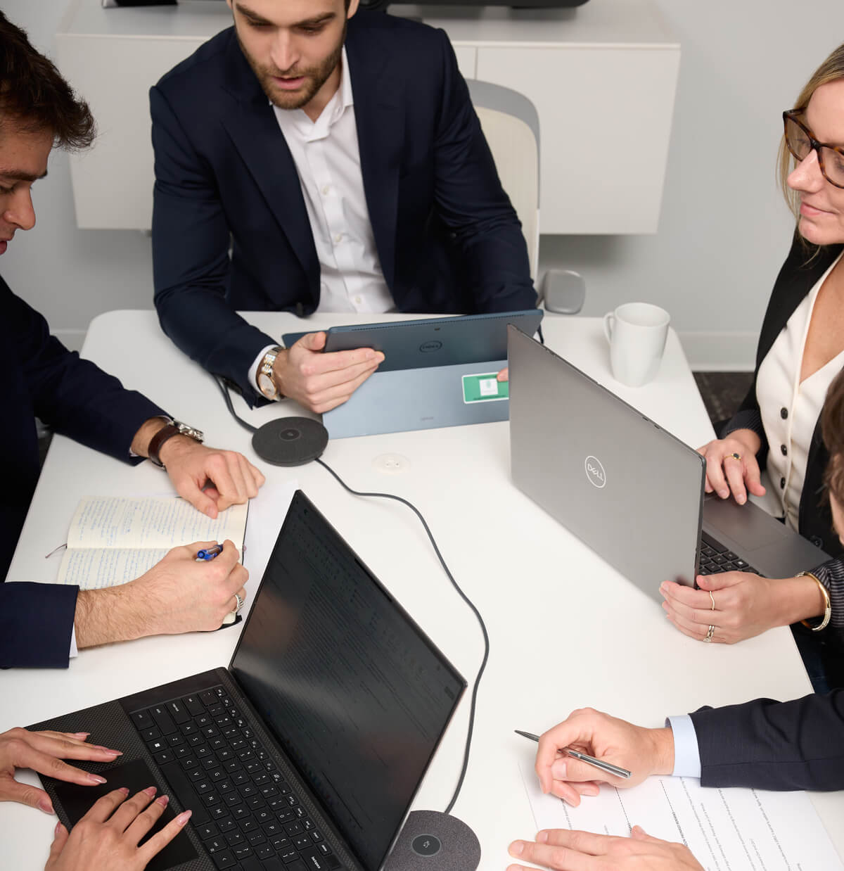A group of businesspeople having a meeting in a conference room