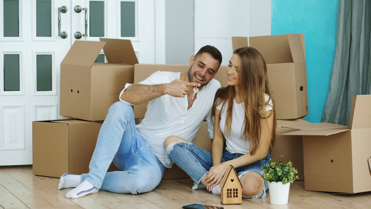 Couple touring their new home