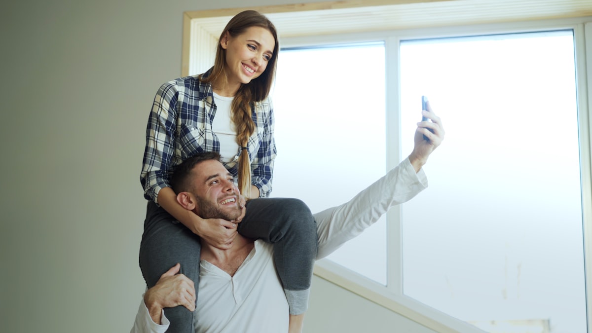 Couple celebrating their home purchase