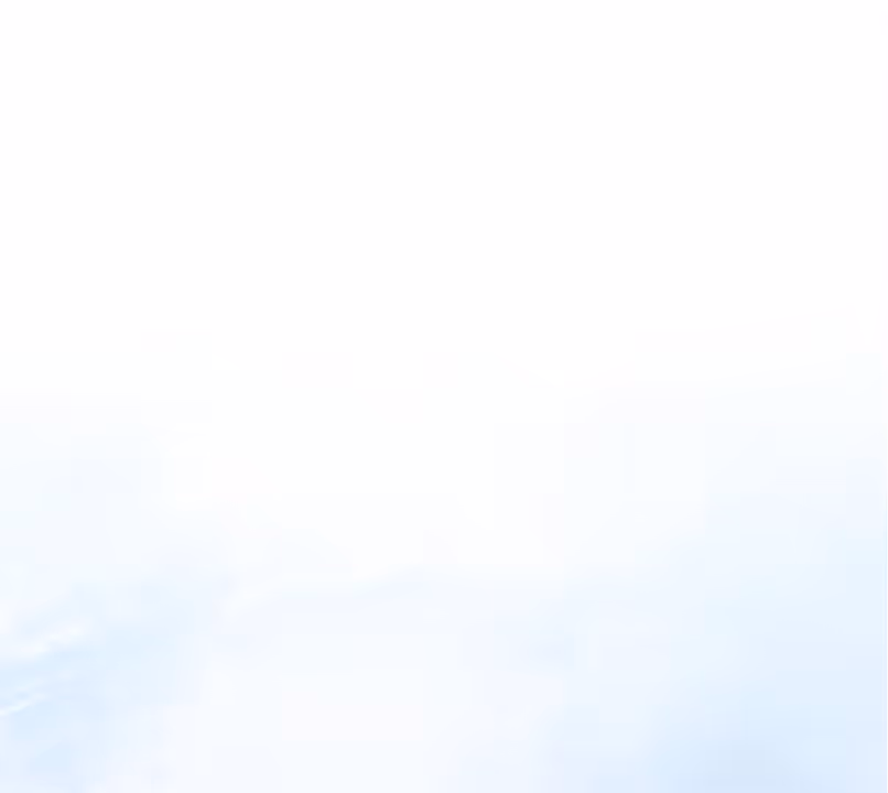 White blurred background with soft blue shades creating a smooth gradient effect.