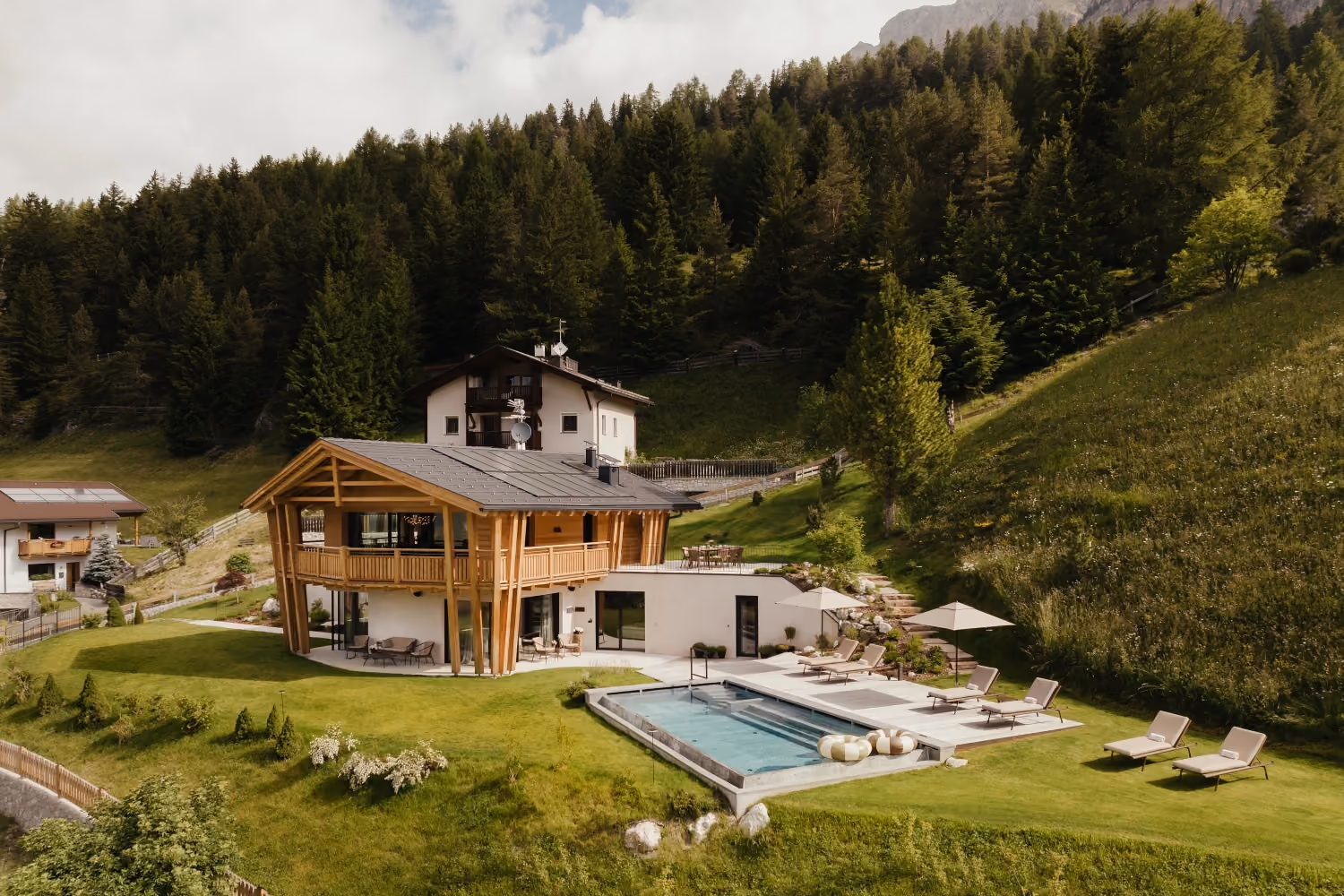 This is the Thumbnail for the Hidden-Away Storybook Chalet in the Italian Alps With Outdoor Heated Infinity Pool, Spa, and Mountain Views item