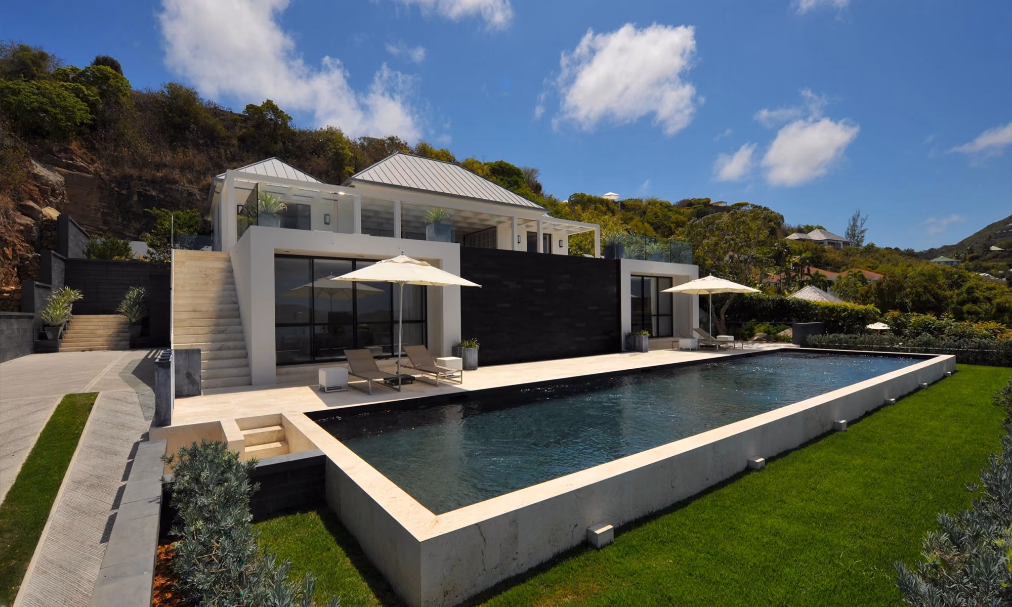 This is the Thumbnail for the Luxurious Villa with Dual Pools, Expansive Ocean Views, and Elegant Living Spaces in Pointe Milou item