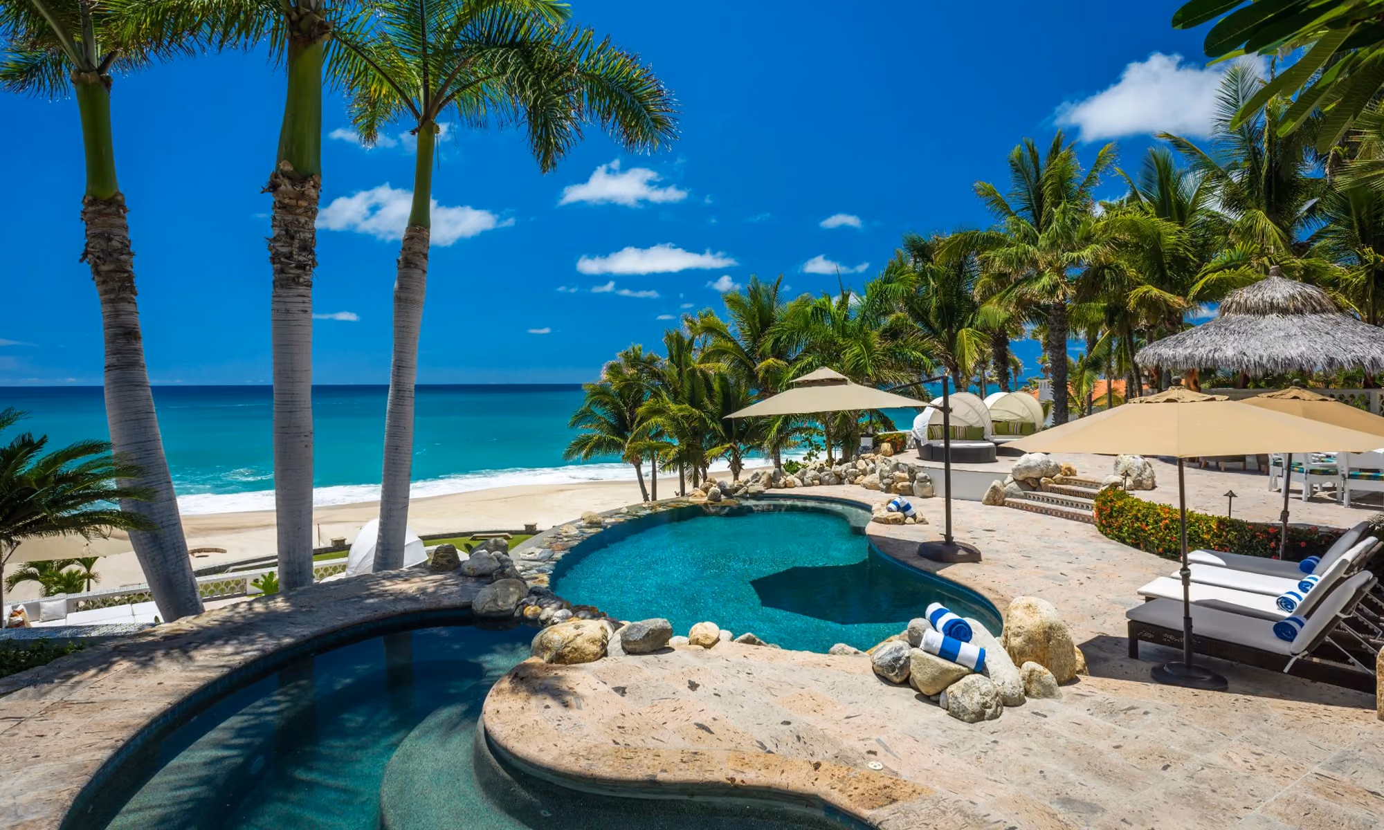 This is the Thumbnail for the Vast Beachfront Mansion Rental in Los Cabos With Palapa Bar & Large Private Gym item