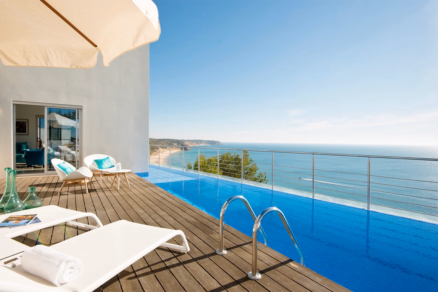 This is the Thumbnail for the Cliffside Villa With Private Pool and Ocean View in Salema Vilage item