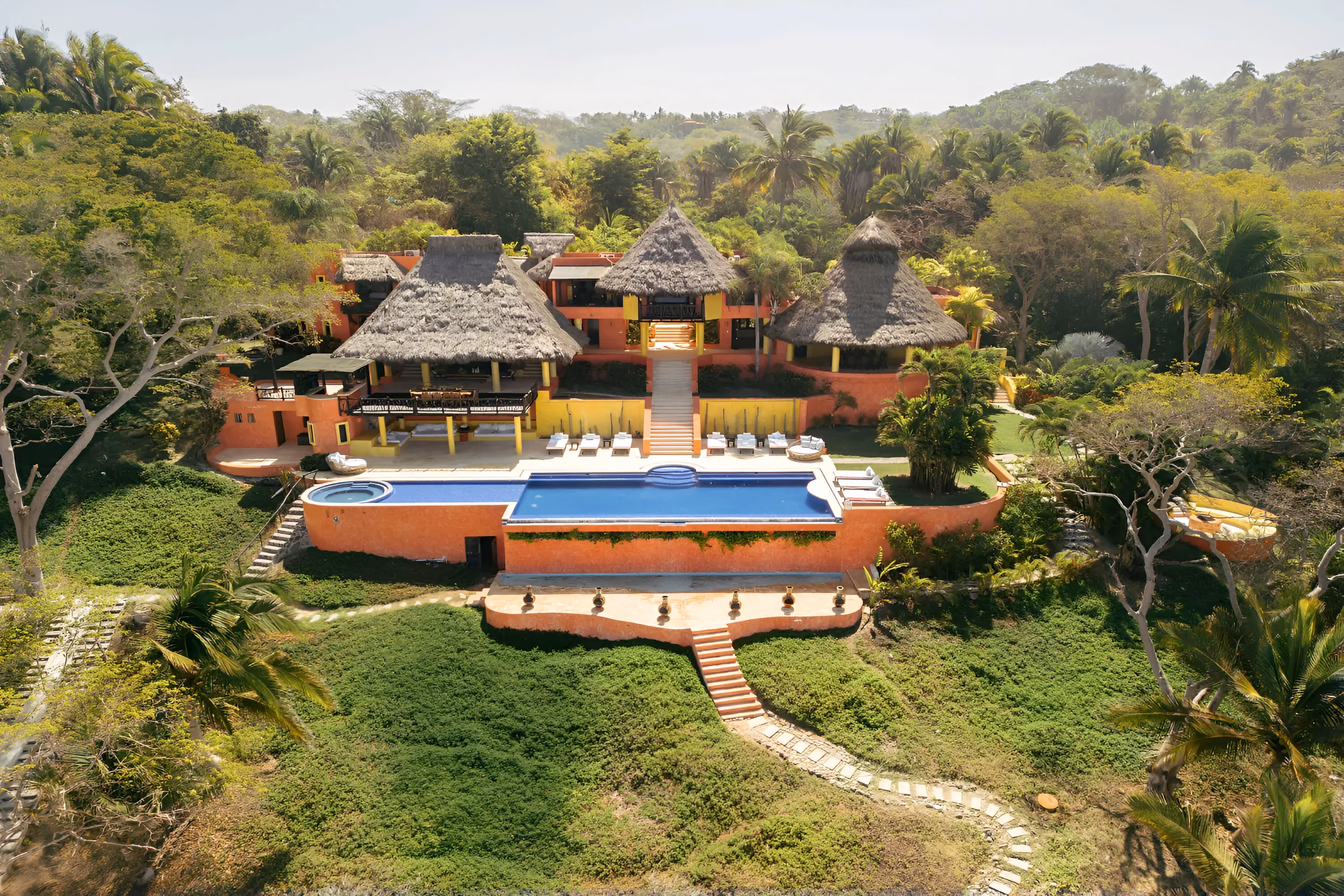 This is the Thumbnail for the Tropical Beachfront Villa in Sayulita with Heated Infinity Pool, Direct Beach Access, and Staff item