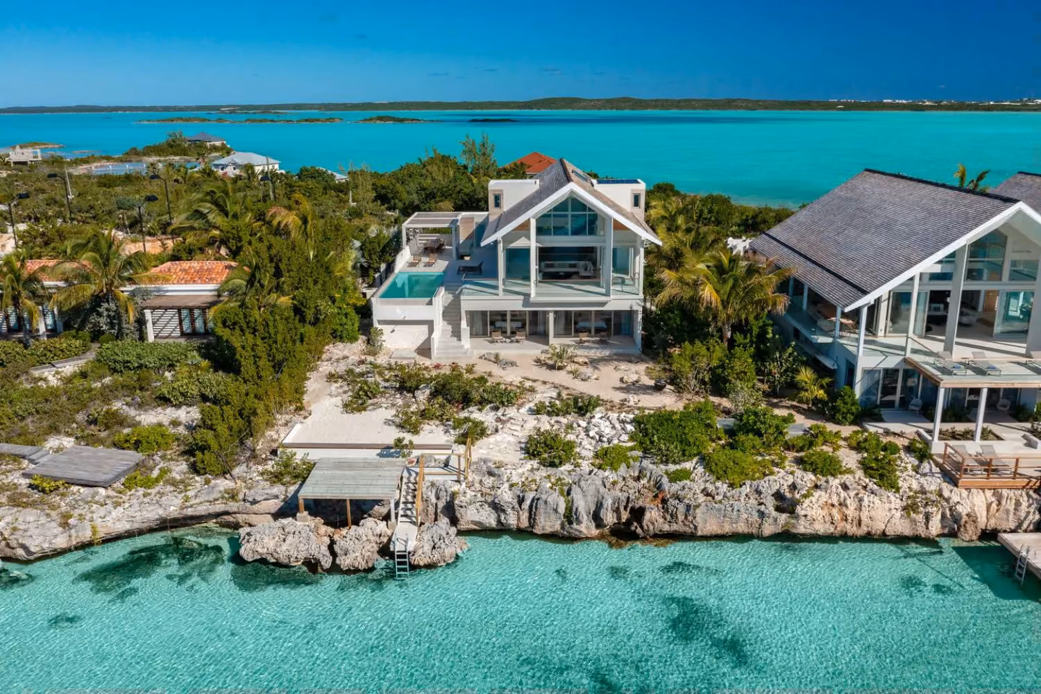 This is the Thumbnail for the Chalk Sound Villa With Infinity Pool, Over Water Hammocks, Deck, & Watersports Equipment item