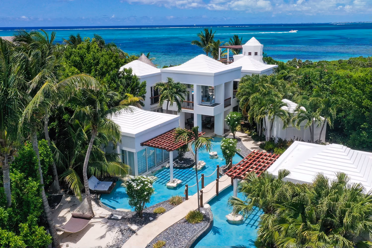This is the Thumbnail for the 3-Pool Beachfront Villa With 6 Independent Suites & Private Access to Grace Bay item