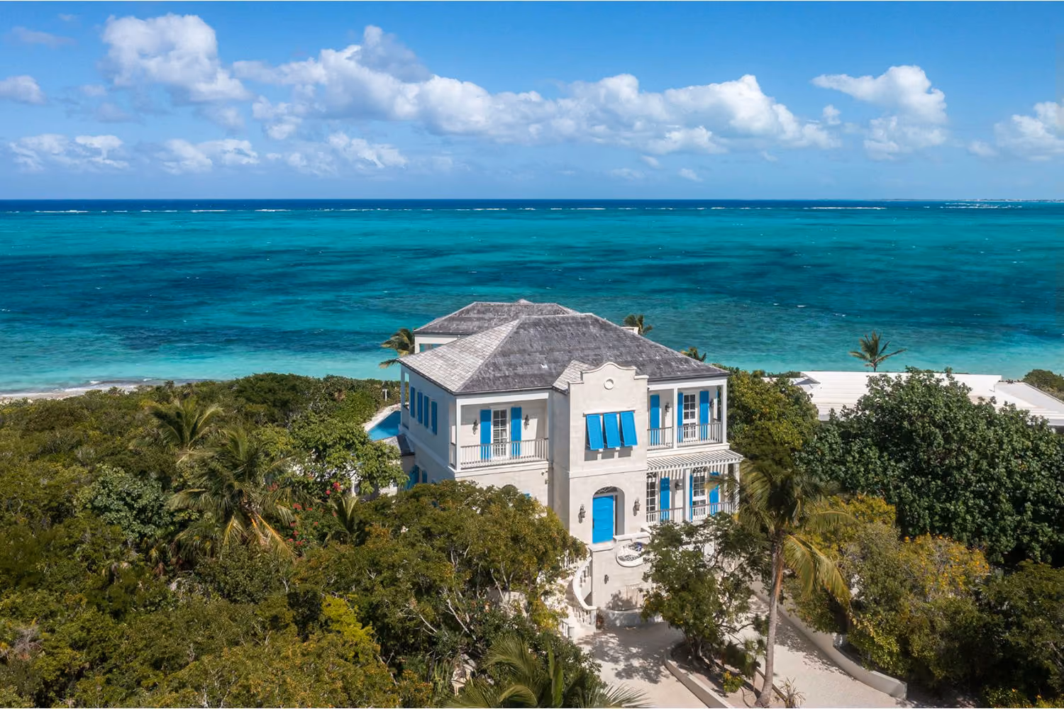 This is the Thumbnail for the Oceanfront Private Turtle Cove Villa Directly on White Pristine Beach item