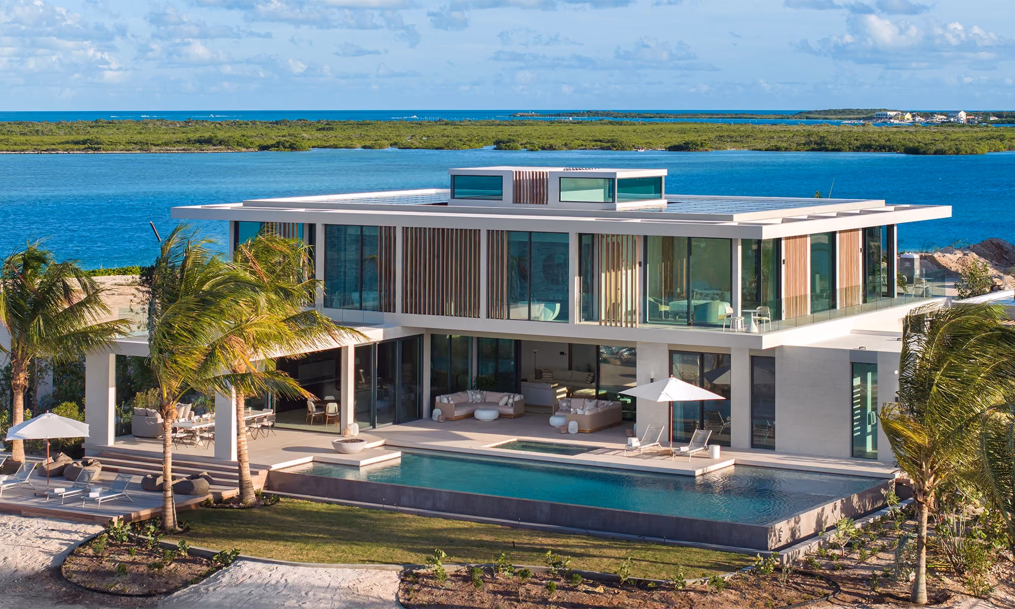 This is the Thumbnail for the Privileged Grace Bay Villa With Infinity Pool, Hot Tub, Gym, Pickleball, Tennis & Wraparound Ocean Views item