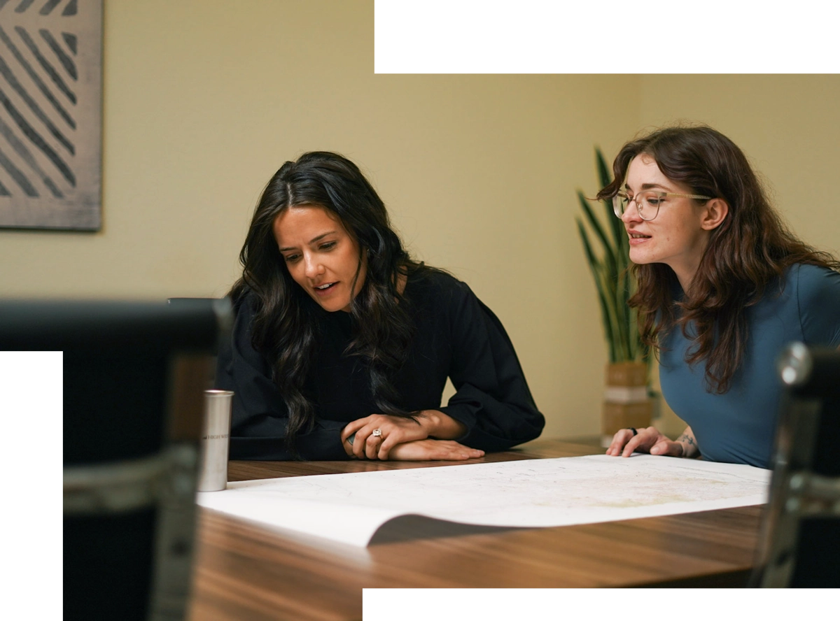 Attorney Chase Hallis reviewing plans with client