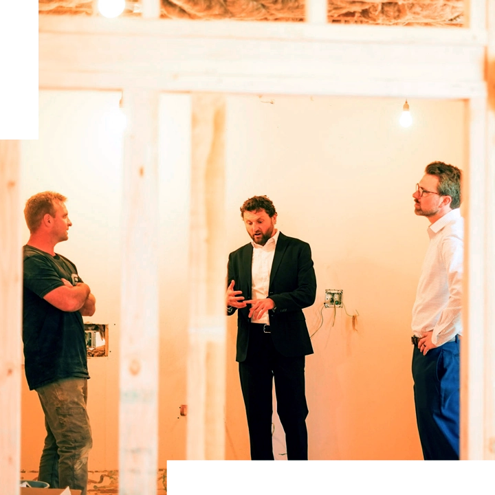 Attorneys Grant and Keenan meet with general contractor onsite