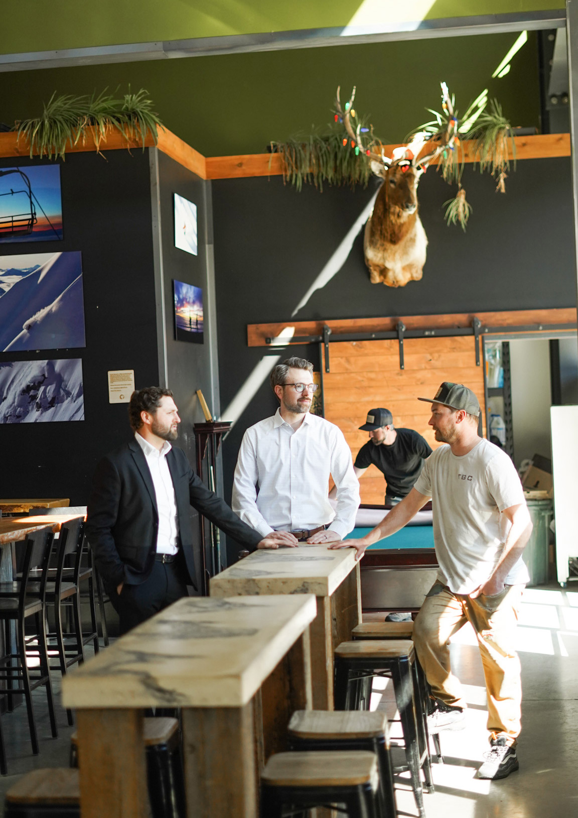 Two attorneys meeting with brewer client
