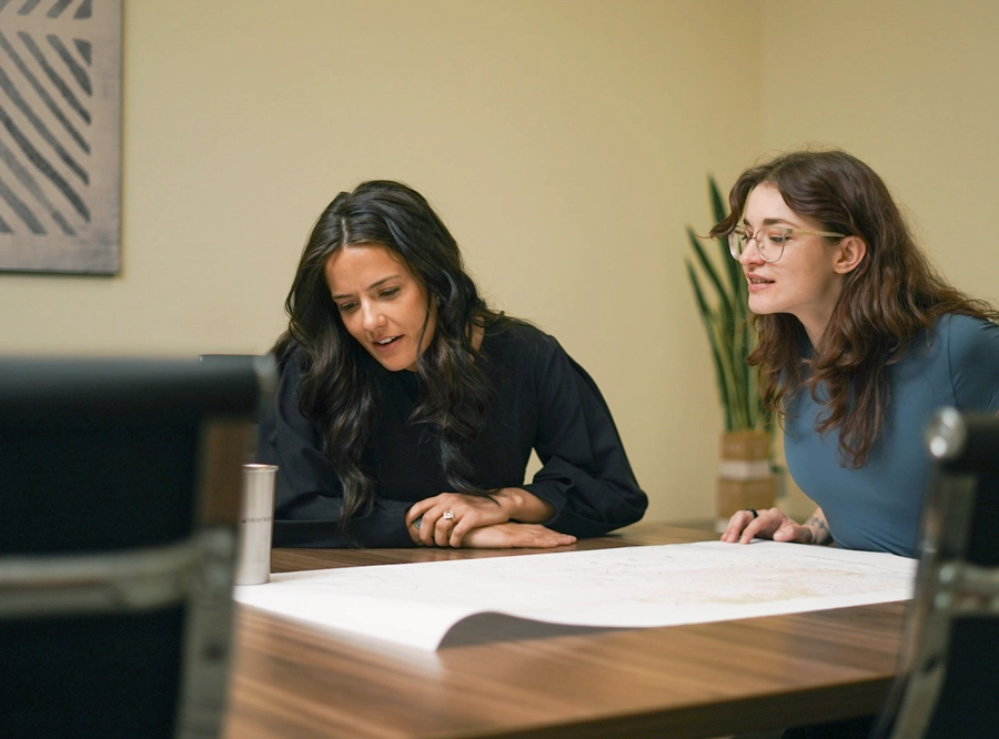 Attorney reviewing plans with business entrepreneur