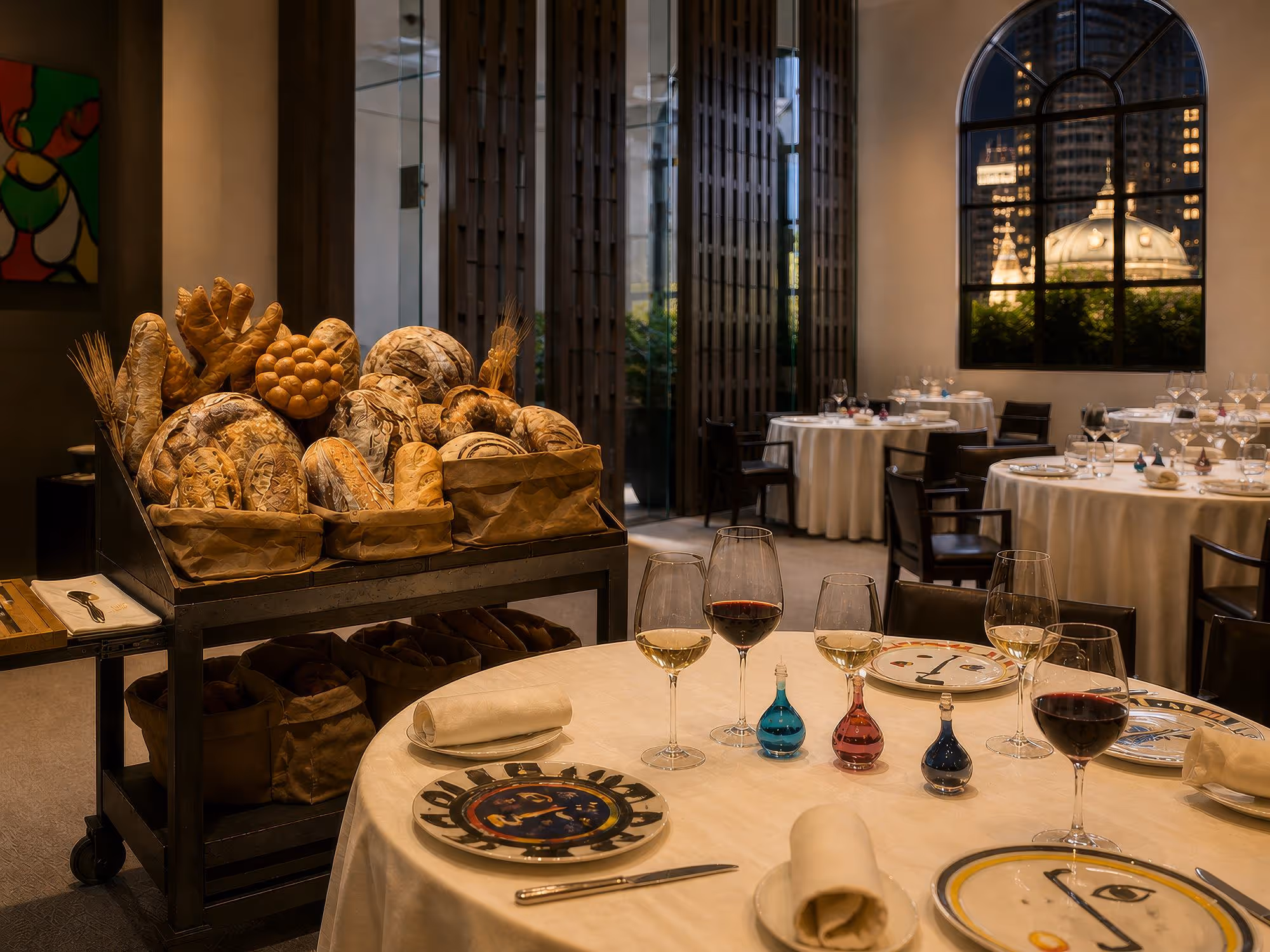 Restauarnt Guy Savoy Las Vegas interior table setting with wine and bread