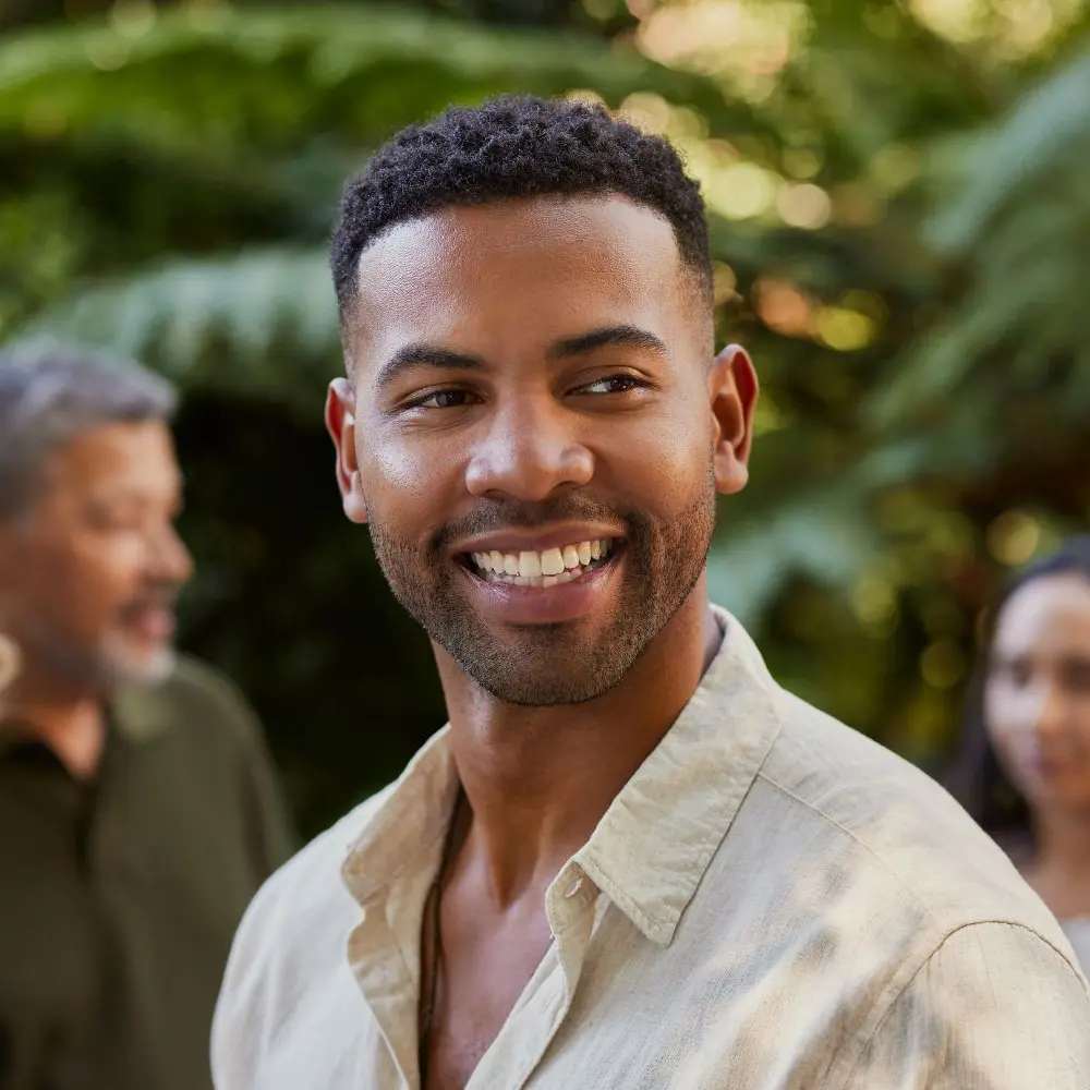 man smiling outside