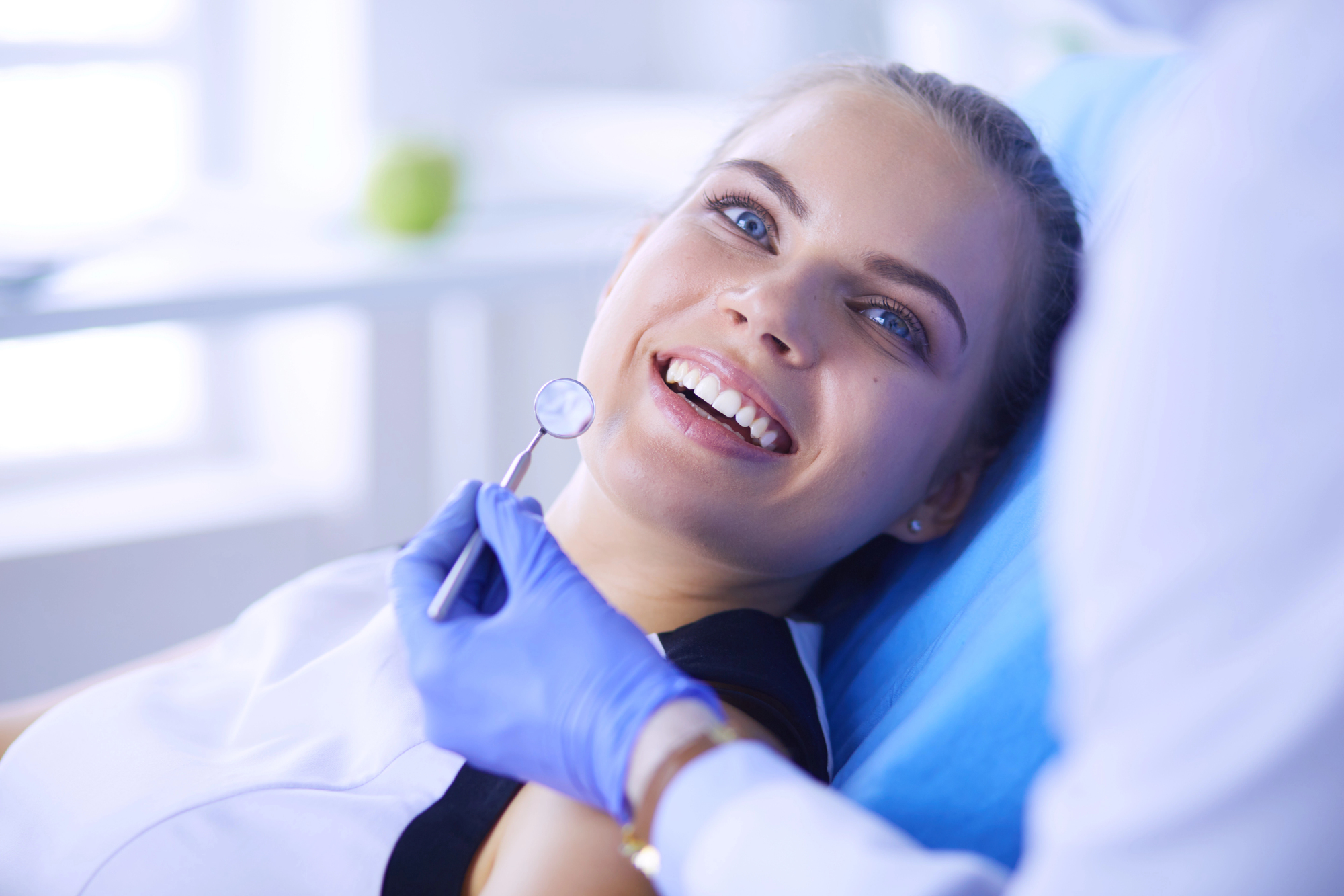 female dental patient smiling
