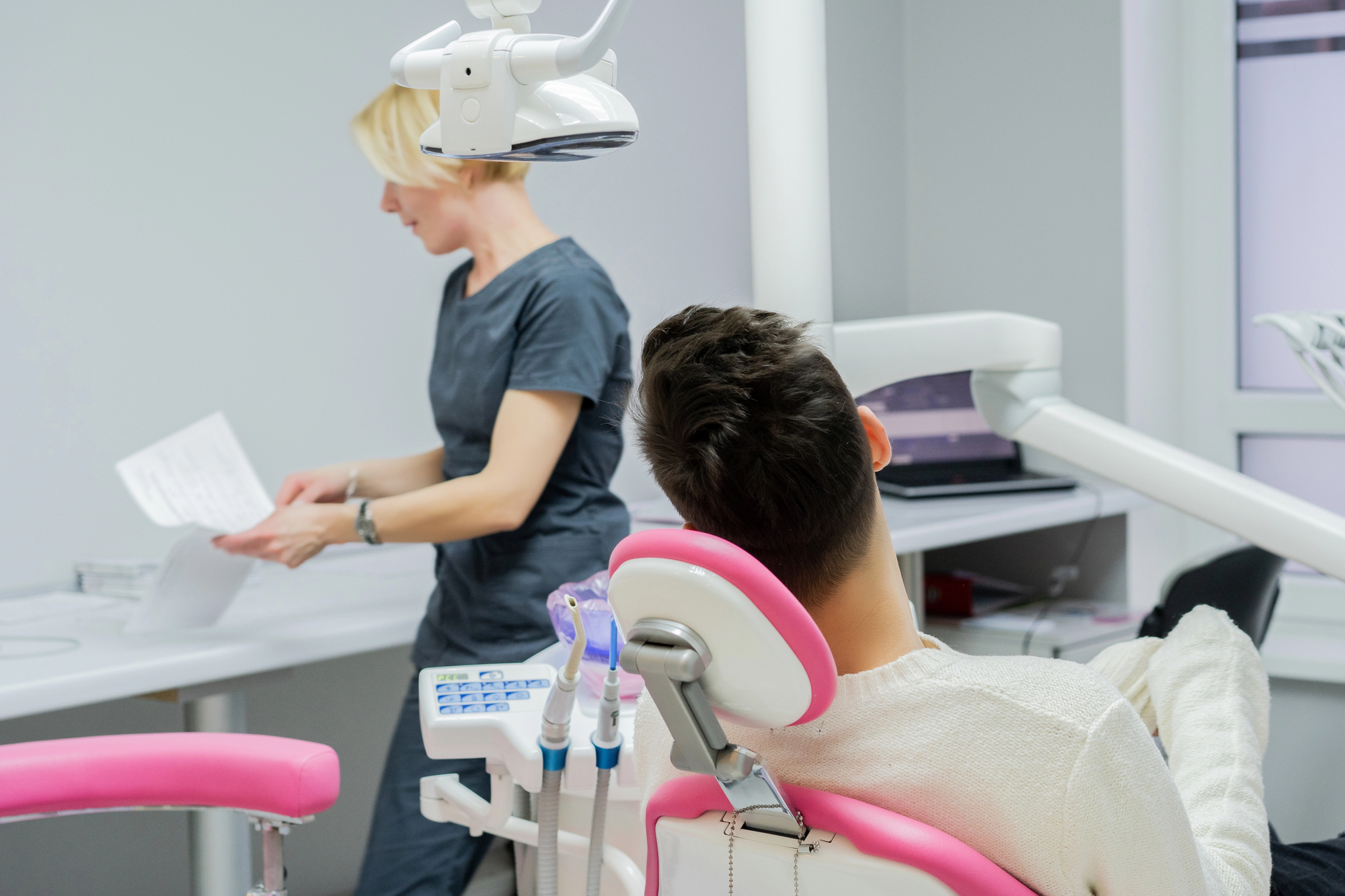 male dental patient with female dentist