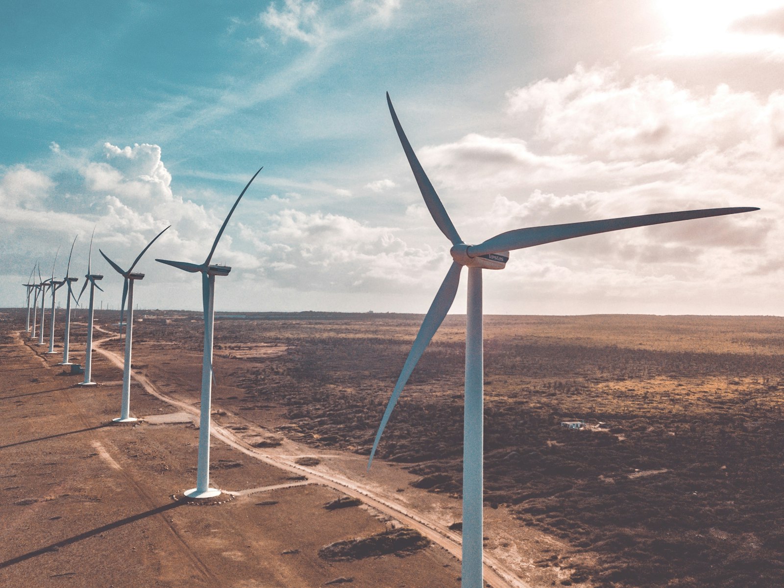 Wind turbines on desert sand