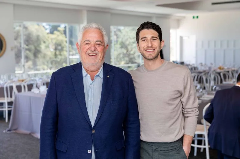 Two members of the Jadig Finance team at a private credit event