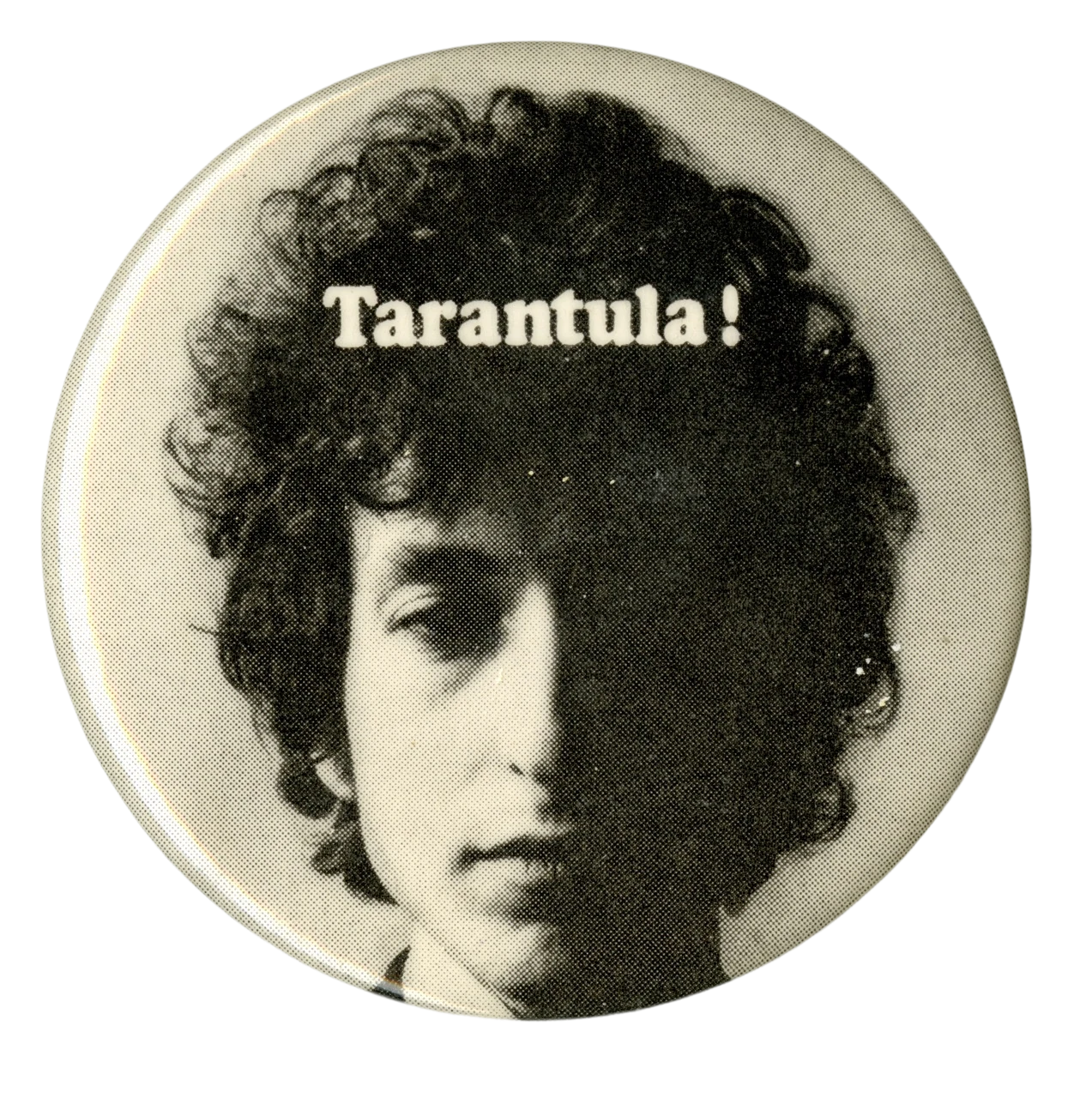 A circular button of Bob Dylan's face with the text 'Tarantula!'
