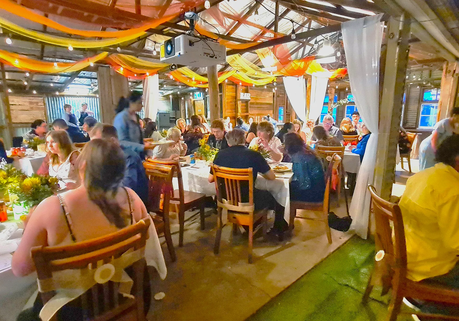 Inside decor of Galilee School Year 12 Graduation with rustic theme. 