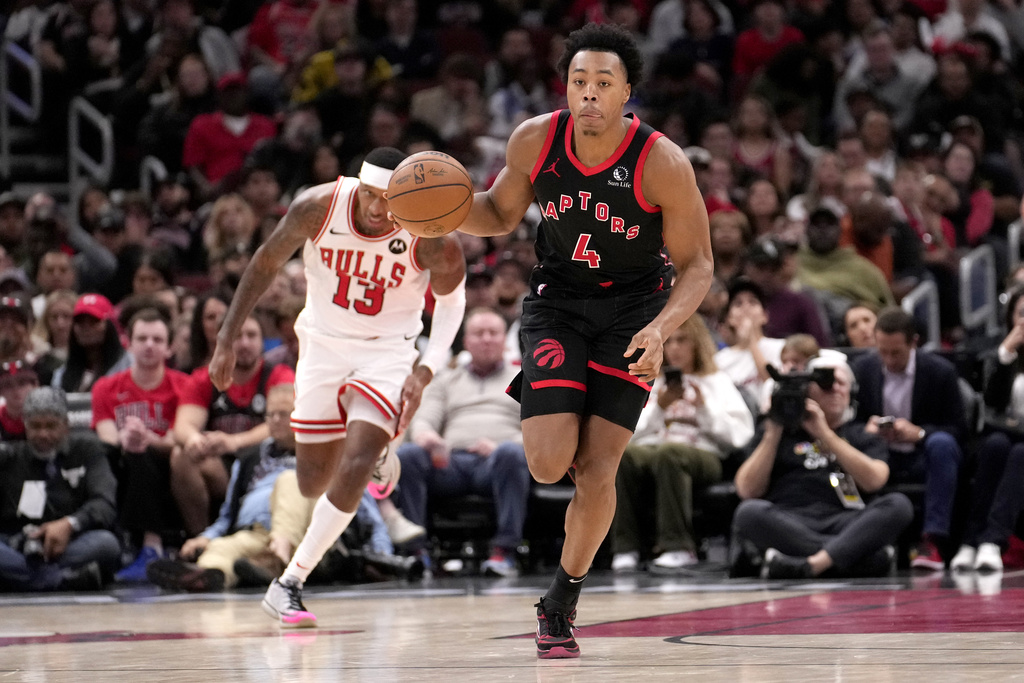 Toronto Raptors' Scottie Barnes advances the ball during an NBA basketball game