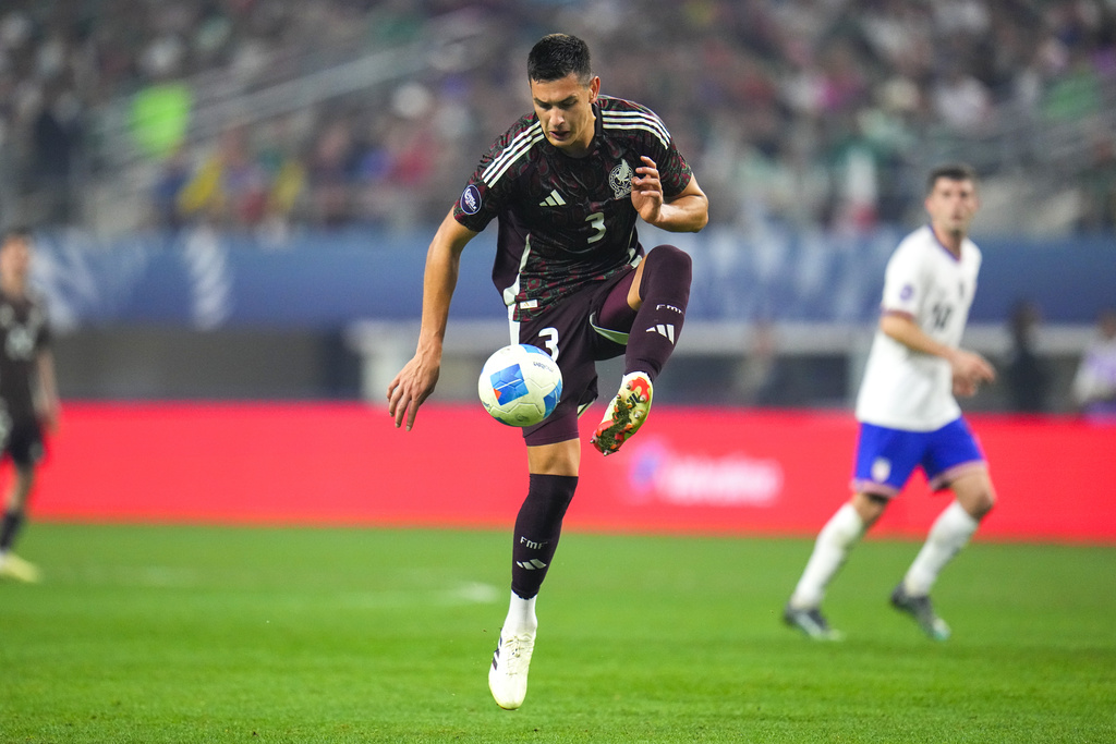 Mexico's César Montes controls the ball during a CONCACAF Nations League championship soccer match between Mexico and the United States.