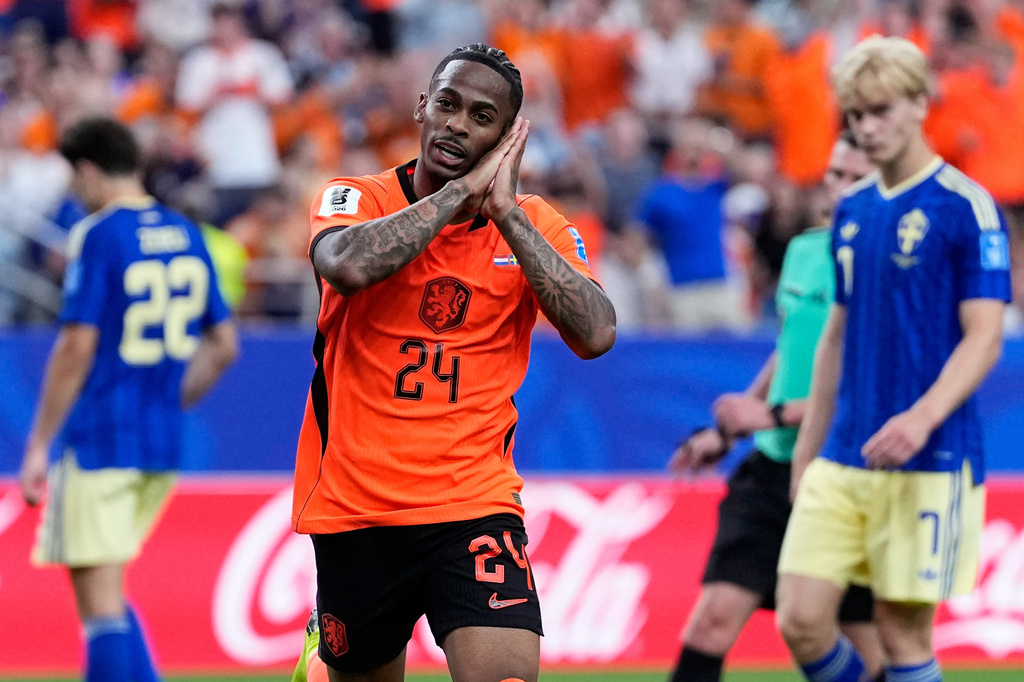Netherlands' Crysencio Summerville celebrates after scoring his side's fifth goal during the World Cup Group F soccer match between the Netherlands vs. Sweden.