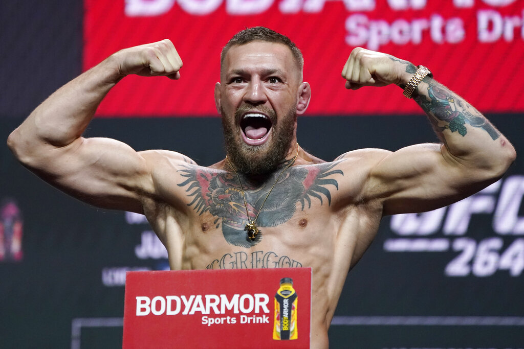 Conor McGregor poses during a ceremonial weigh-in for a UFC 264 mixed martial arts bout Friday, July 9, 2021, in Las Vegas.