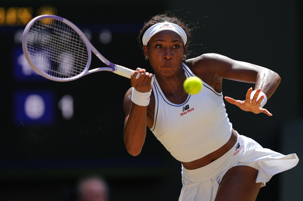 Coco Gauff of the United States returns the ball during the women's singles quarter-final match against Jessica Pegula of the United States at the Wimbledon Tennis Championships in London, Tuesday, July 7, 2026.