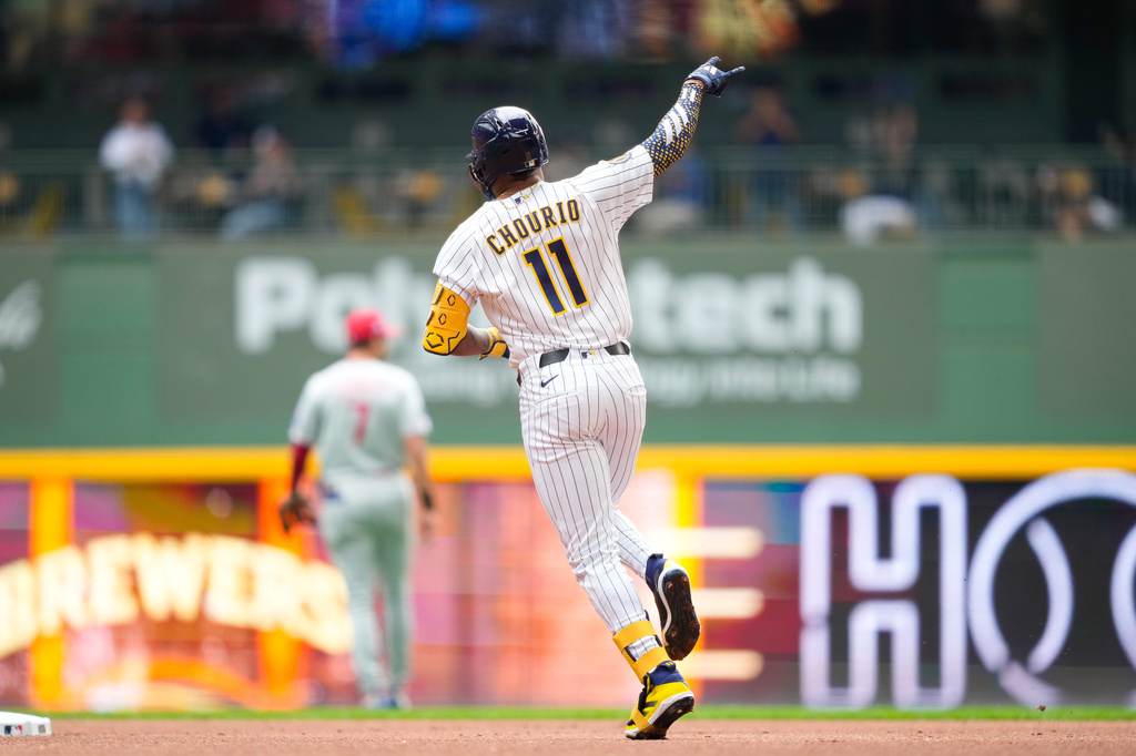 Milwaukee Brewers' Jackson Chourio (11) reacts as he runs the bases after hitting a home run during the first inning of a baseball game against the Philadelphia Phillies, Sunday, June 14, 2026, in Milwaukee.