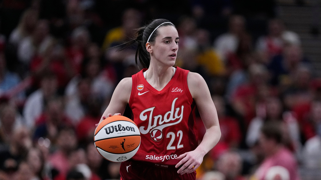 Indiana Fever G Caitlin Clark handles the ball during a WNBA game against the Atlanta Dream.