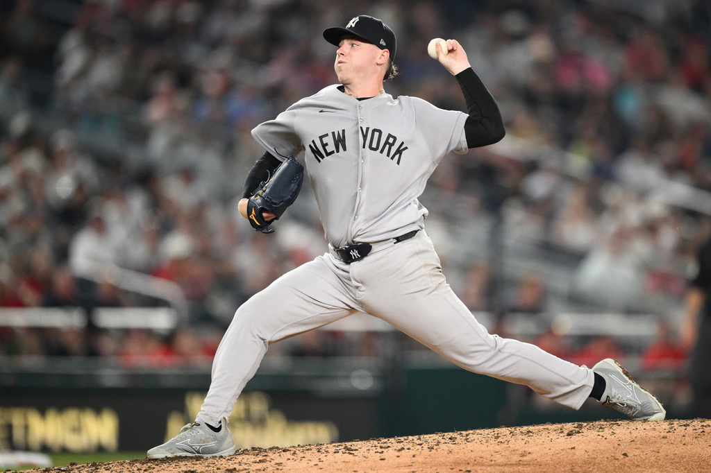 New York Yankees SP Ryan Weathers throws a pitch against the Washington Nationals.