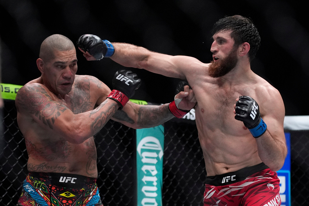 Magomed Ankalaev lands a punch during a UFC 313 mixed martial arts light heavyweight title bout Saturday, March 8, 2025, in Las Vegas.