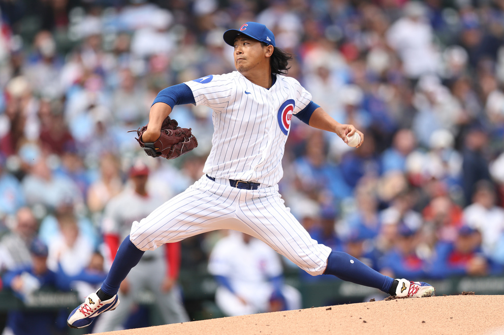 Cubs SP Shota Imanaga throws a pitch during the first inning against the Nationals.