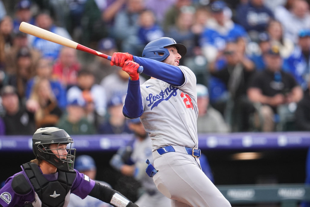 Los Angeles Dodgers RF Kyle Tucker hits a home during during an MLB game against the Colorado Rockies.