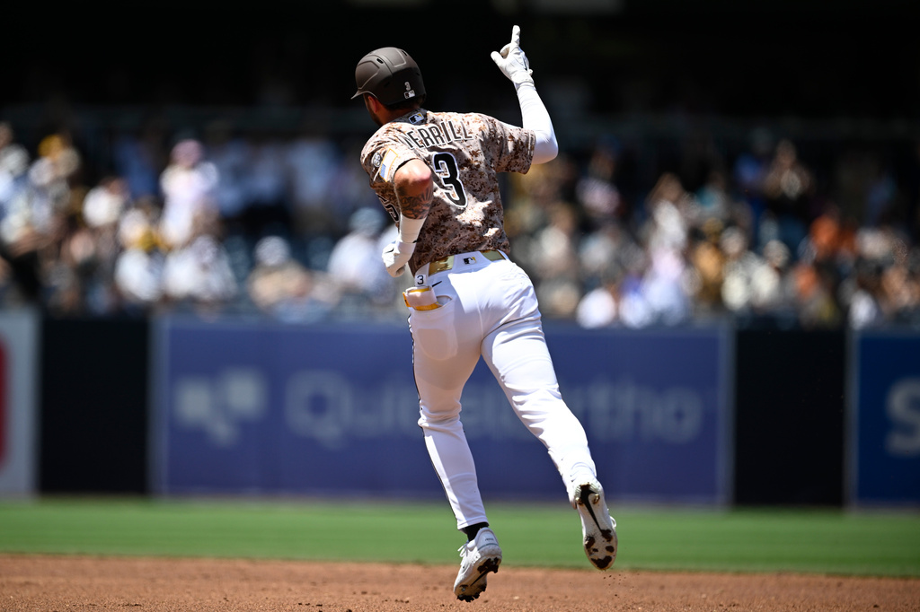 Padres CF Jackson Merrill rounds the bases following a two-run home run vs. the Giants.