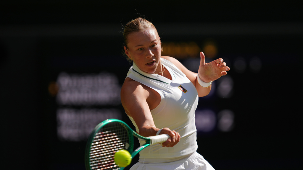 Tennis star Amanda Anisimova plays during a match the Wimbledon Tennis Championships.